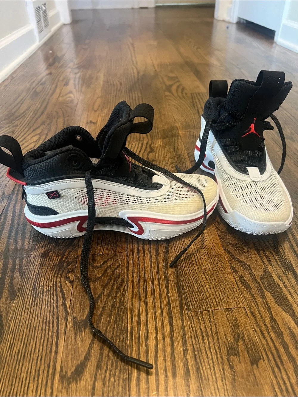 Jordan Kids' White Black Sneakers with Red Accents